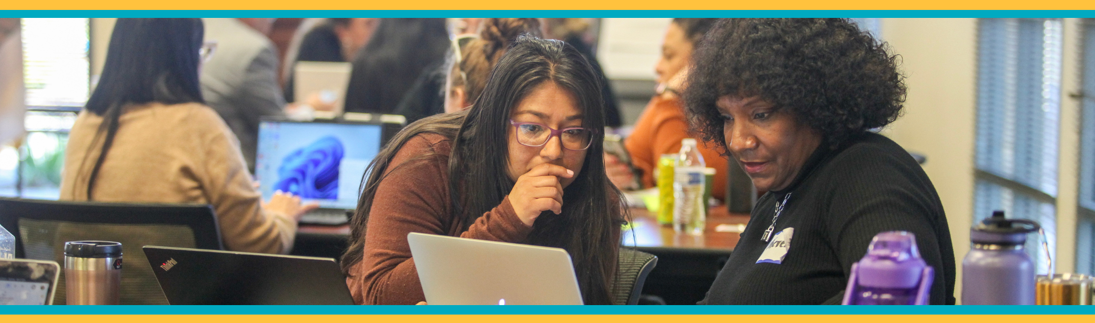 two female teachers learning together