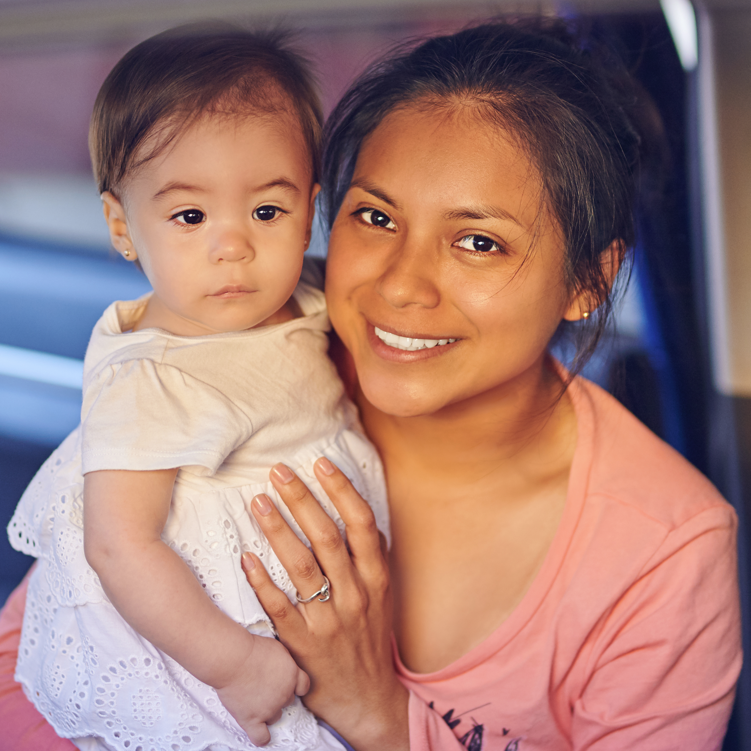 Student holding a baby