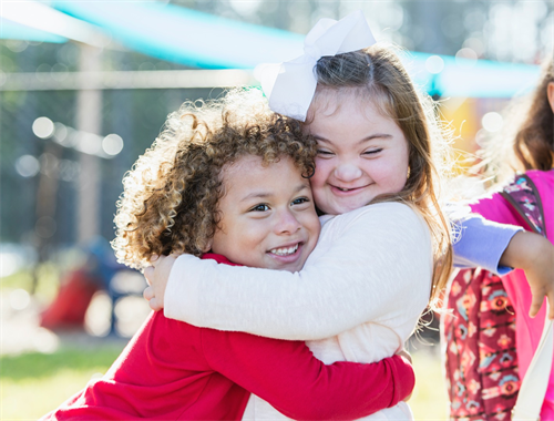 students hugging