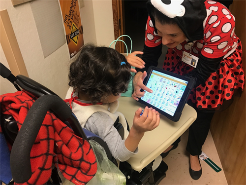 student playing on tablet