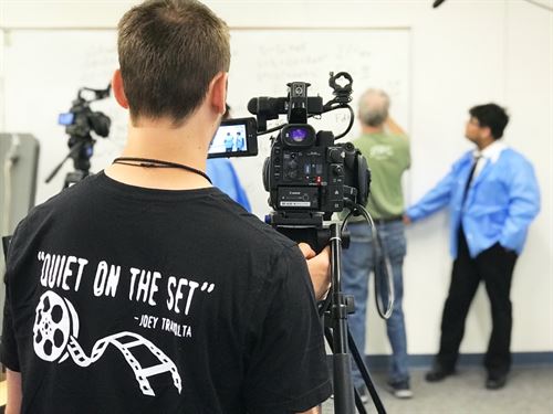 student with back to camera