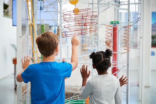 students drawing on window